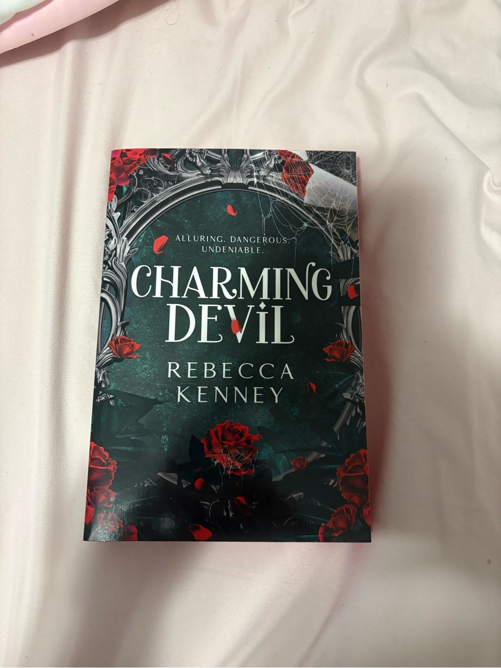 Barnes & Noble Charming Devil by Rebecca Kenney — Dark Green & Red Cover